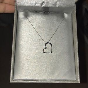 Peoples silver heart necklace